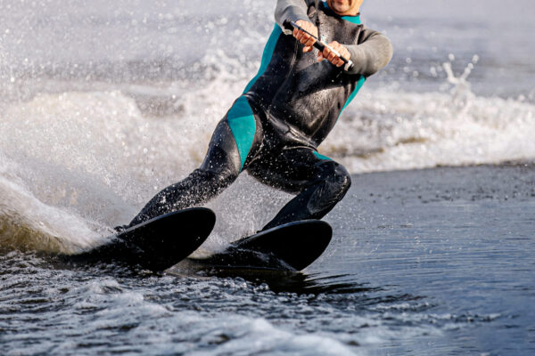 Man,Riding,Water,Ski,On,Summer,Lake.,Black,Neoprene,Wetsuit Man,Riding,Water,Ski,On,Summer,Lake.,Black,Neoprene,Wetsuit